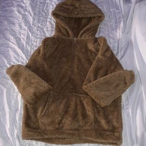 slightly worn brown hoodie/sweater.